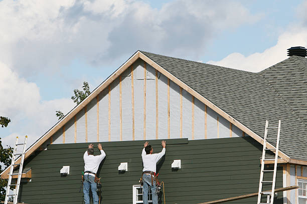 Professional Siding Installation technician working in Camden, TN